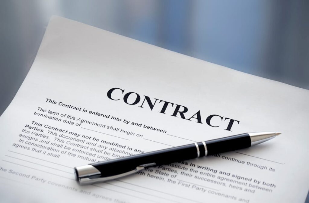 Business leader reviewing contract document in office