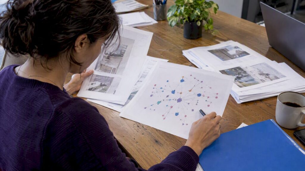 Printed entity graph beside source documents