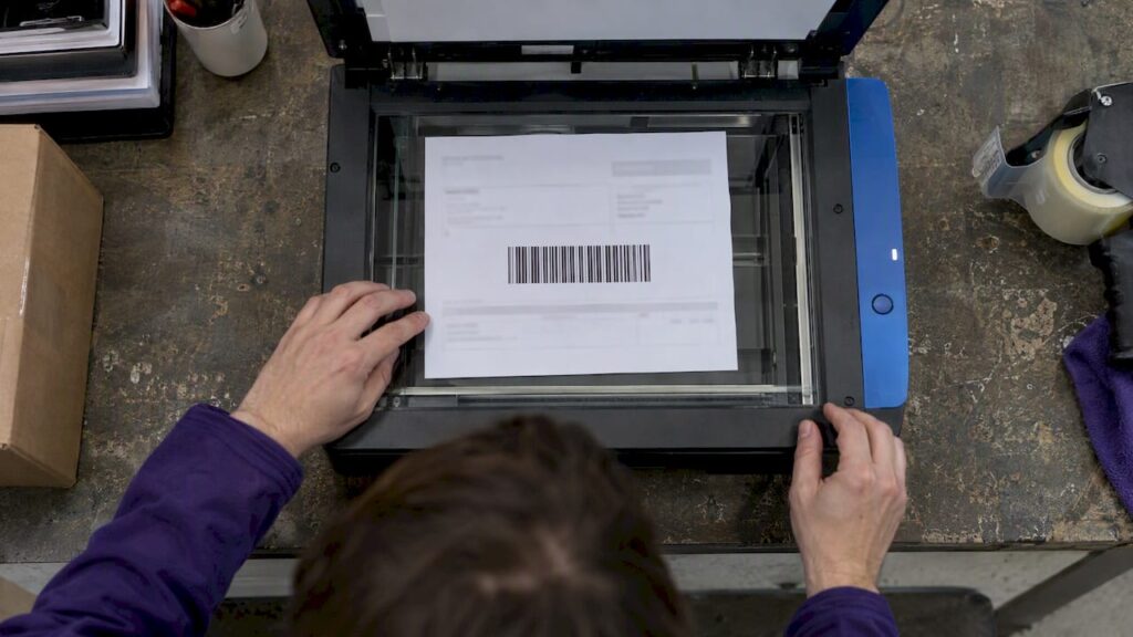 Barcode on a packing slip being scanned