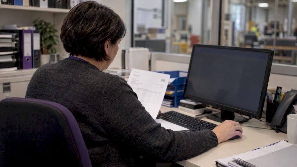 Analyst checks invoice extraction before posting